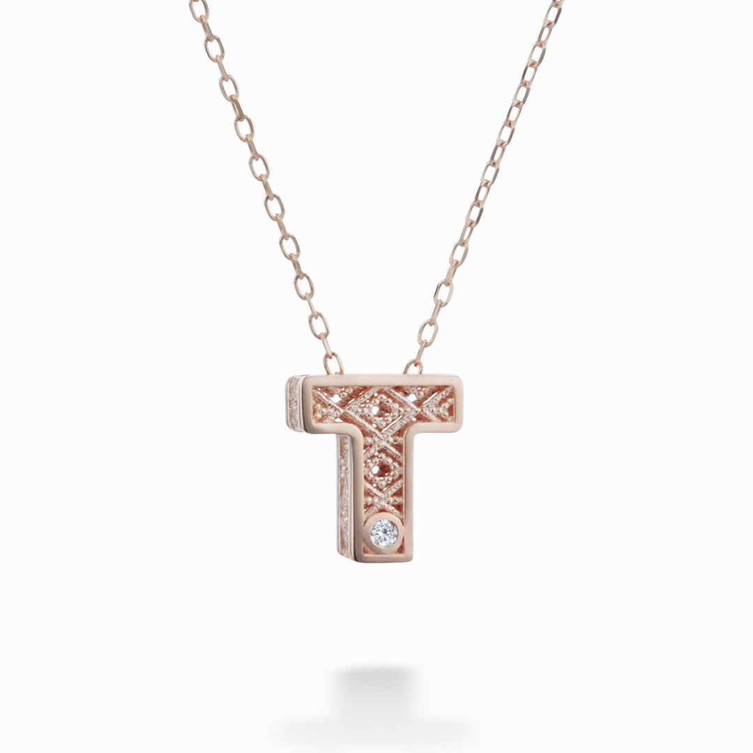 Mikiko cl letra t oro rosa 18k diam. ct.0,01MDLETTO3