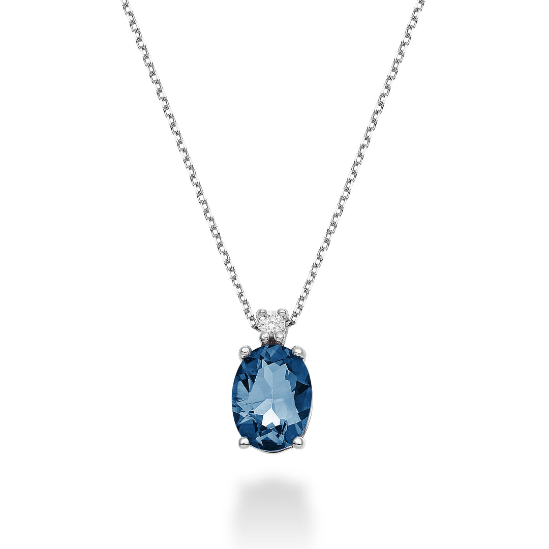 Nihama cl 18k topaze bleue de Londres ovale 8x6 ct.1,40 diam. ct.0,025 ND5036O4TPBL