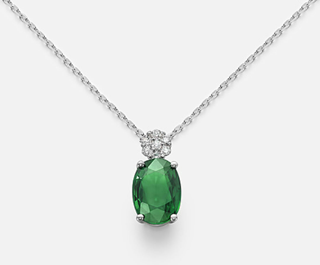 Mikiko cl 18k smeraldo ovale 7x5 ct.0,60 diam. ct.0,045 MD5025O4BE