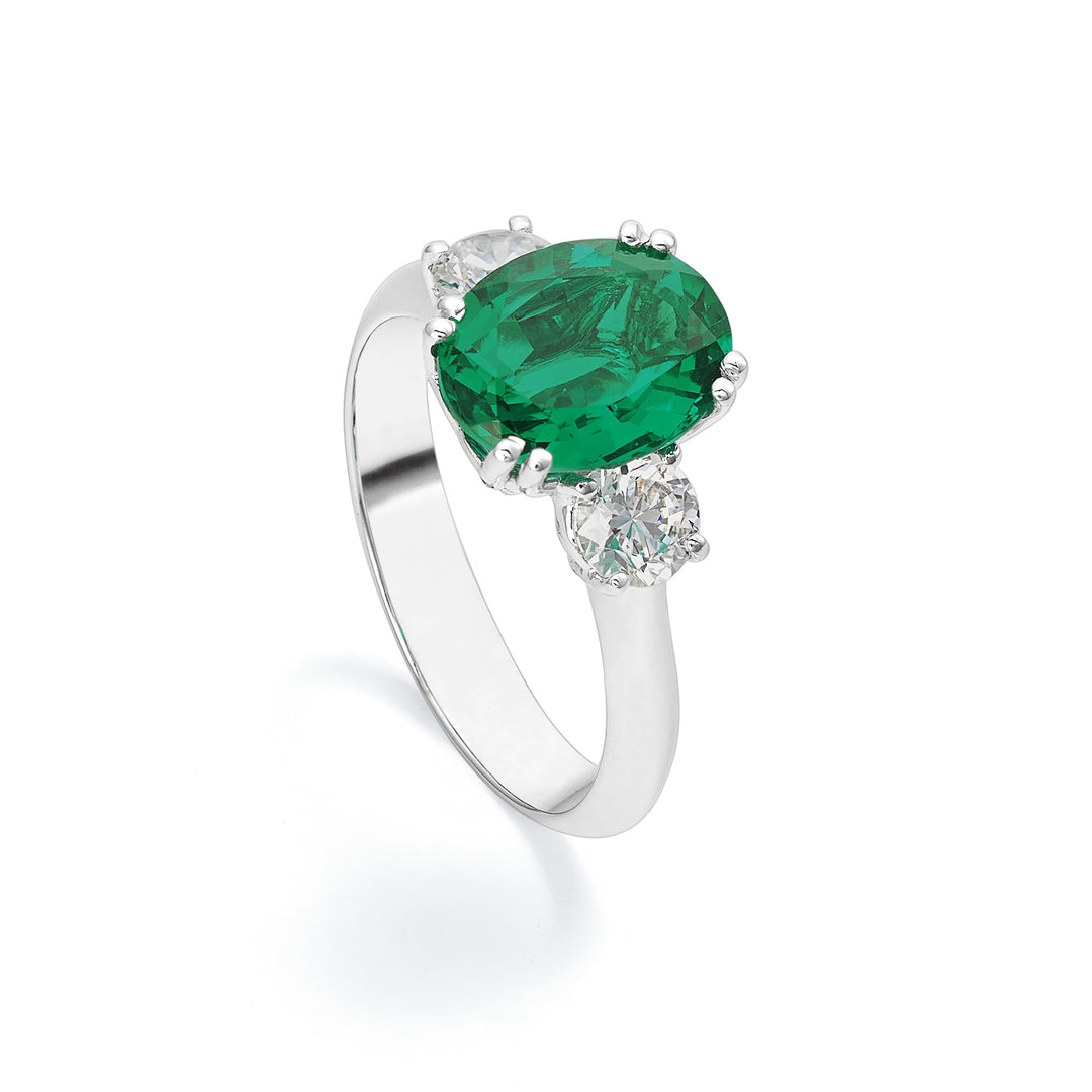 Anillo X-Diamond xd oro 750 con lgd round 0.30x2 y esmeralda