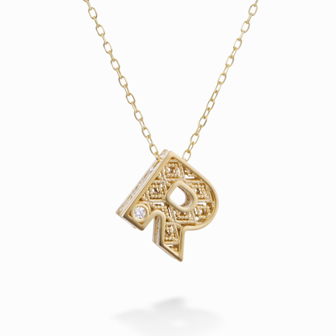 Mikiko cl letra r oro amarillo 18k diam. ct.0,01 MDLETRO1