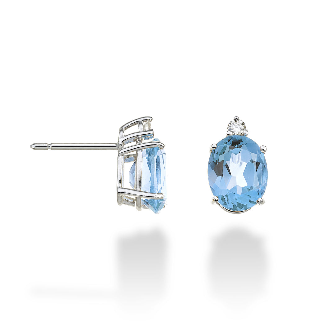 Nihama o topacio azul ovalado de 18k 7x9 ct.4,20 diam. ct.0,08 NO5080O4TPAZ