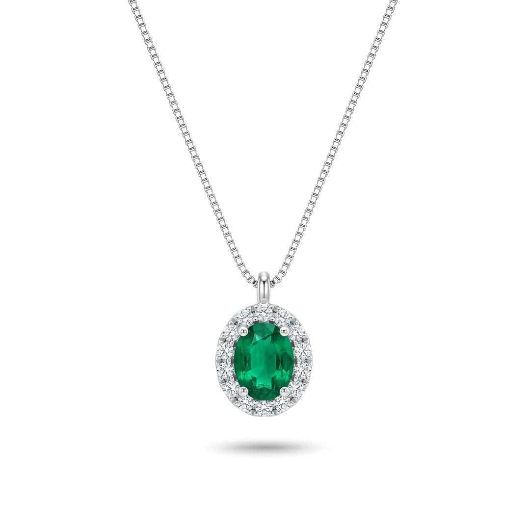 Nihama cl 18k esmeralda ovalada 5x4 con borde de diamantes ND5202O4BE
