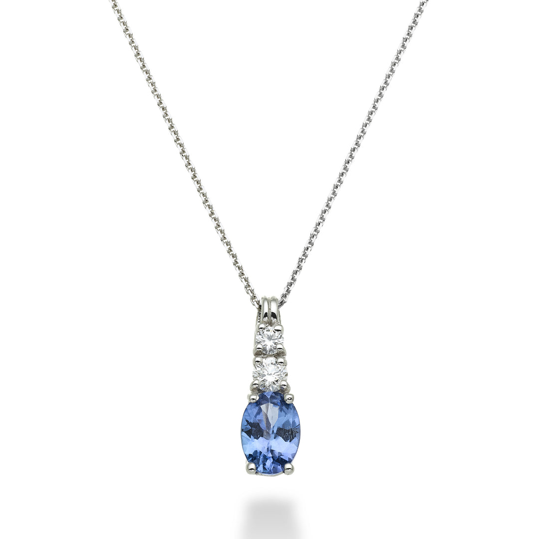 Nihama cl 18k tanzanita n. ovalado 7x5 ct.0.60 dia ct.0.15 ND5056O4TZN