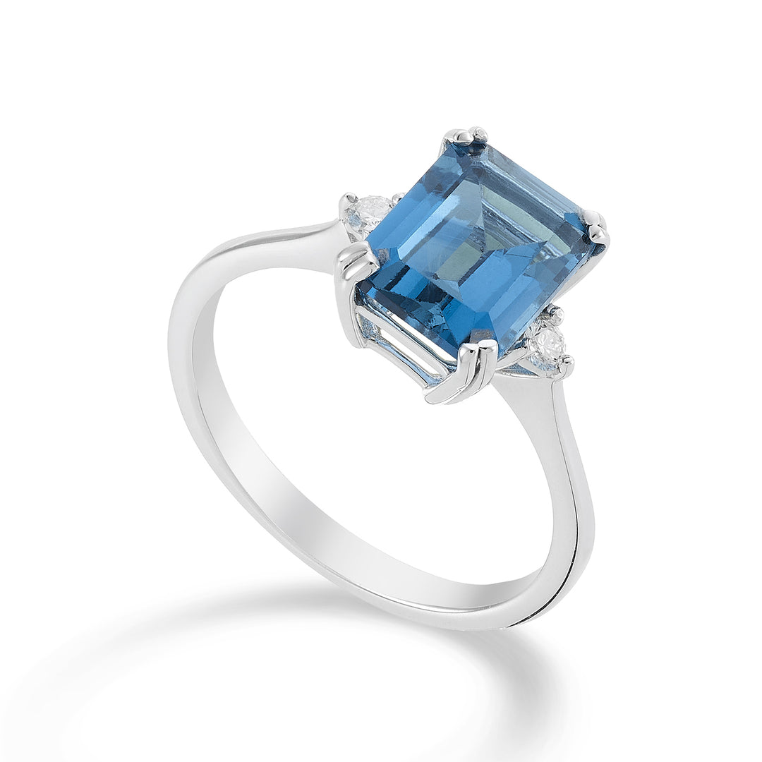Nihama un topacio azul Londres octogonal de 18k 7x9 ct.2,65 diám. ct.0,08 NACL090DITPBL4O4