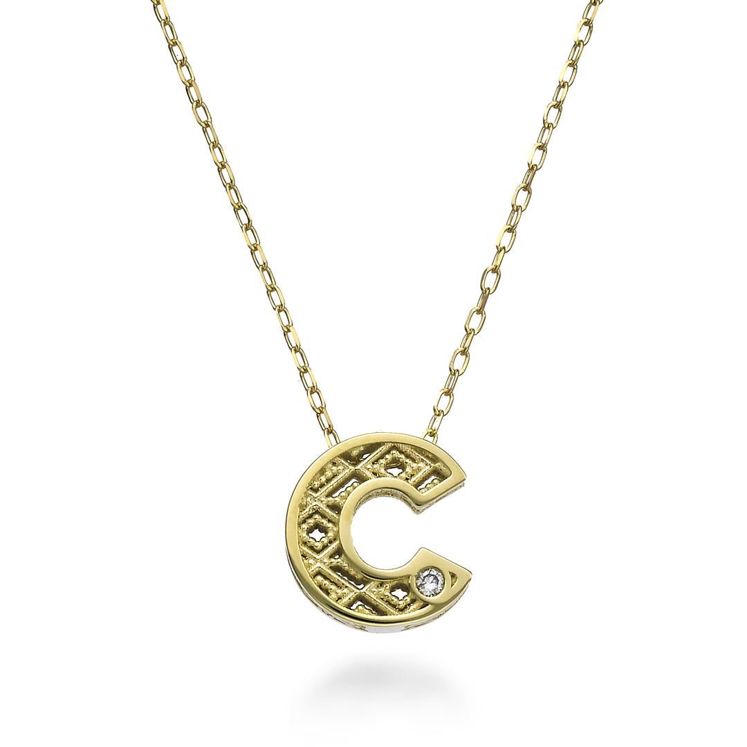 Mikiko cl oro amarillo 18k letra c diam. ct.0,01MDLETCO1