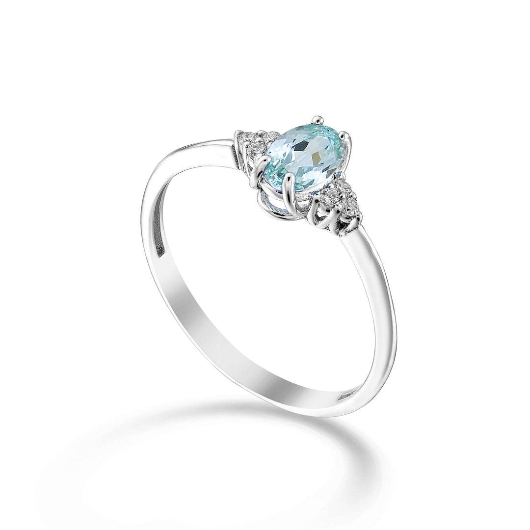 Nihama una turmalina paraiba ovalada de 18k 6x4 y diamantes laterales NA5211O4PAR