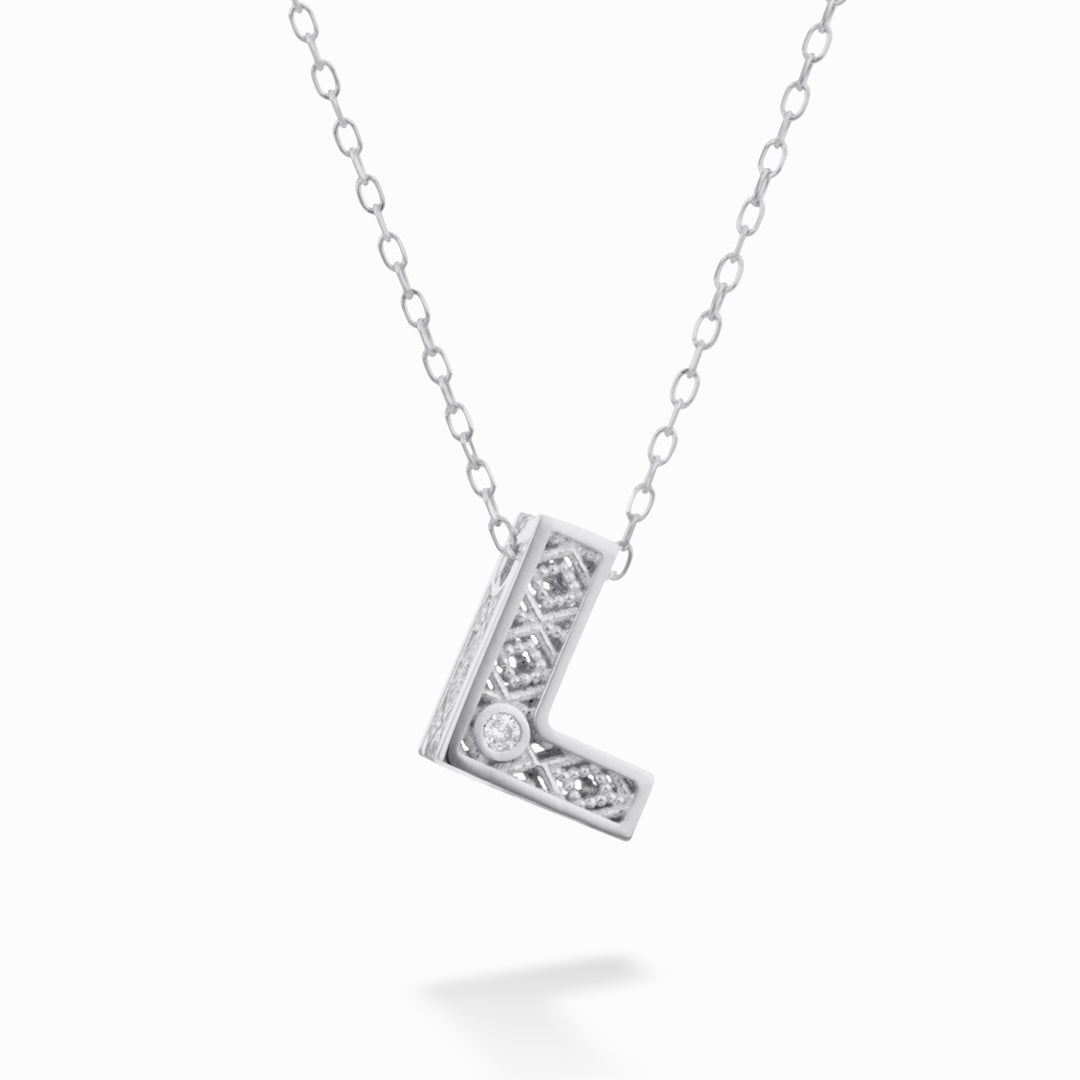 Nihama cl 18k lettre l or blanc diam. ct.0,01 NDLETLO4