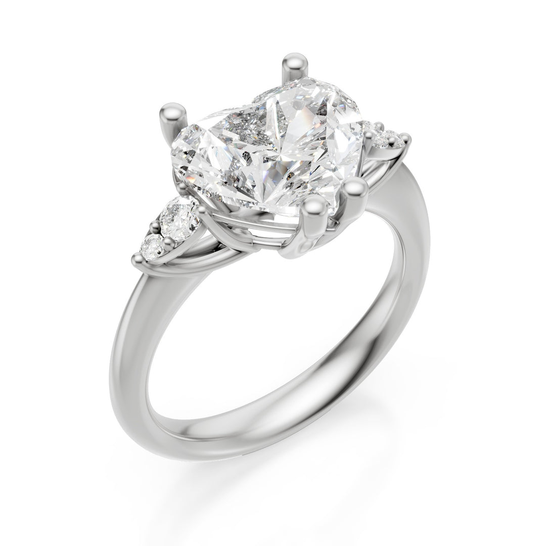 X-Diamond an 18kt lab g.d. ct.tot. 3,16- centr. ct. 3,02 cuore - round lat ct. 0,14 LXDAPU074O4CUBI316