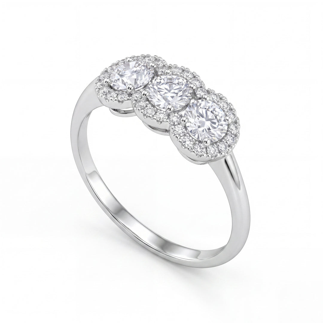 X-Diamond, un laboratoire de trilogie 18 carats g.d. total ct 0,85, cen. ct 0,25x3, contour partagé ct 0,15 LXDATRL877O4BI085