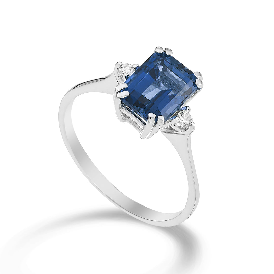 Nihama un topacio azul Londres octogonal de 18k 8x6 ct.2,65 diám. ct.0,06 NACL090DITPBL3O4