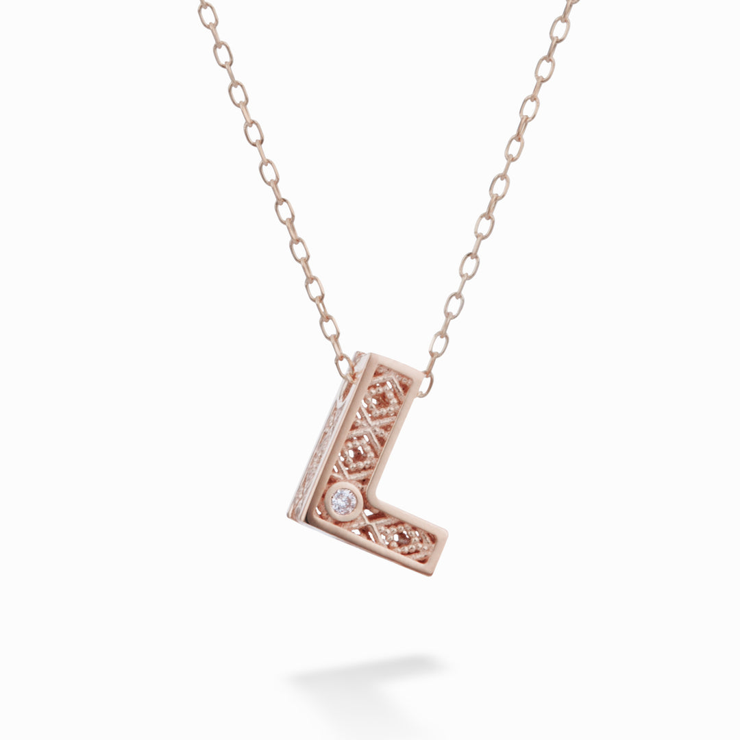 Nihama cl 18k lettera l oro rosè diam. ct.0,01 NDLETLO3