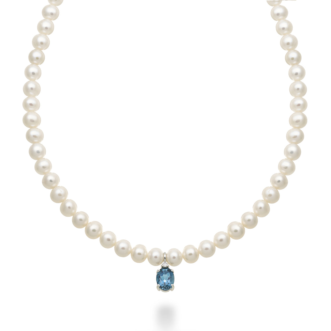 Mikiko cl 18k fw 5,5/6 ovalado topacio azul Londres 6x8 ct.1,40 diam. Anillo de resorte de 0,02 ct MC1576O4TPBL55