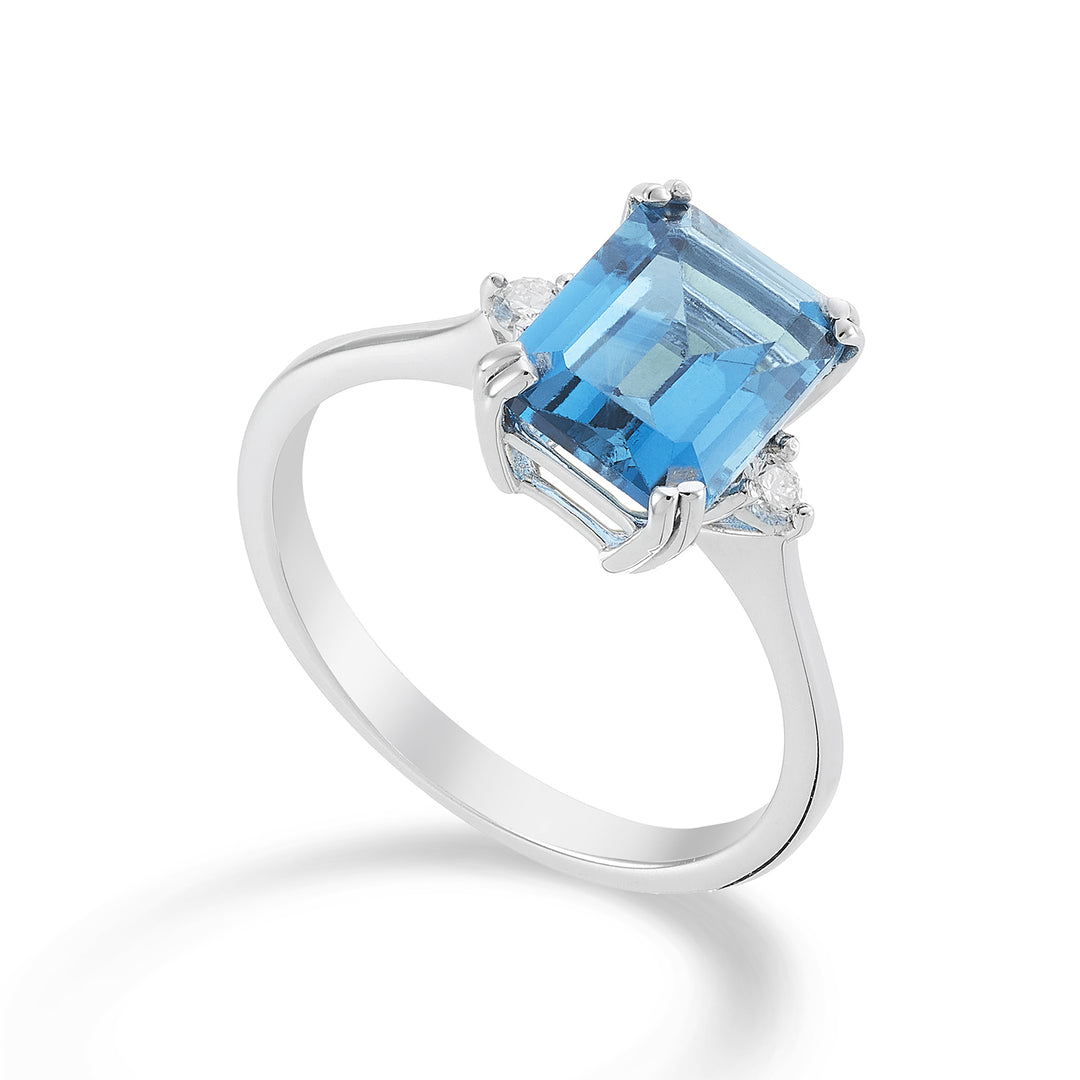 Mikiko an 18k octagonal blue topaz 7x9 ct.2.90 diam. ct.0,08 MACL090DITPAZ4O4