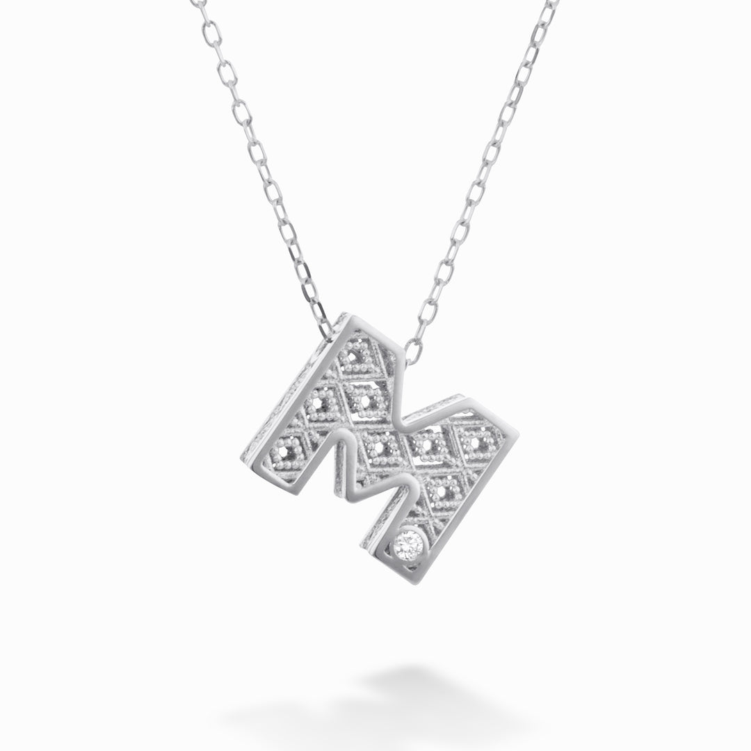 Mikiko cl 18k letter m white gold diam. ct.0.01 MDLETMO4