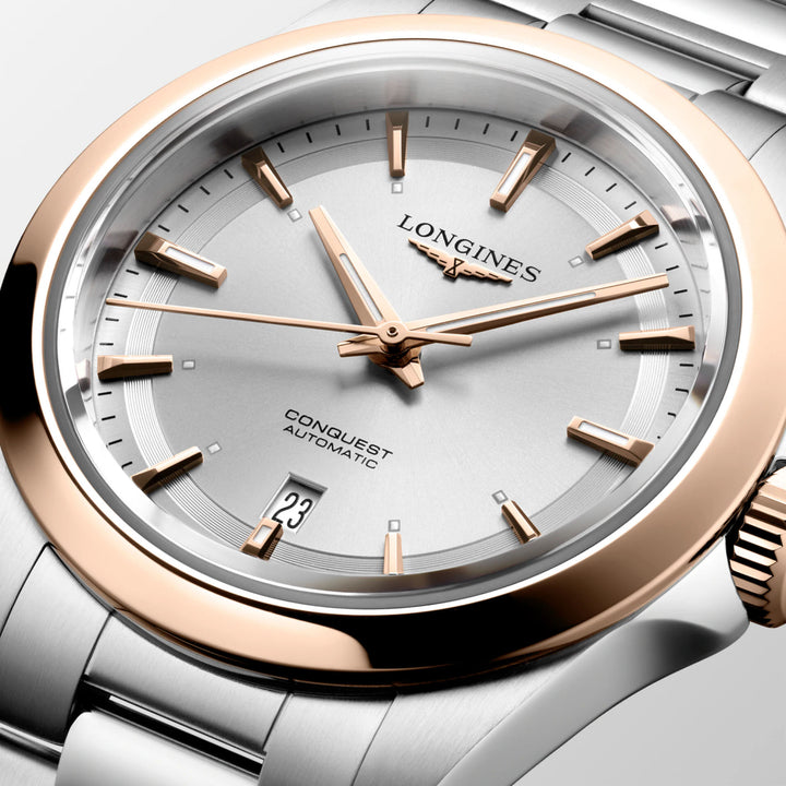 Montre Longines Conquest 30mm automatique argent or rose acier L3.320.5.72.6